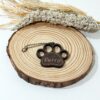 Llavero de madera con forma de huella de perro / gato