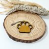 Llavero de madera con forma de huella de perro / gato